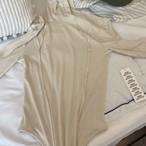 White turtleneck bodysuit